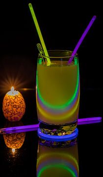 Cocktail with neon lights and candlelight by Jan Schneckenhaus