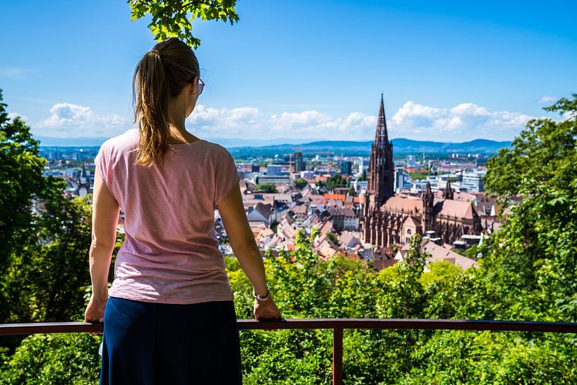 Germany, Blonde young beautiful woman in city freiburg im breisgau by adventure-photos