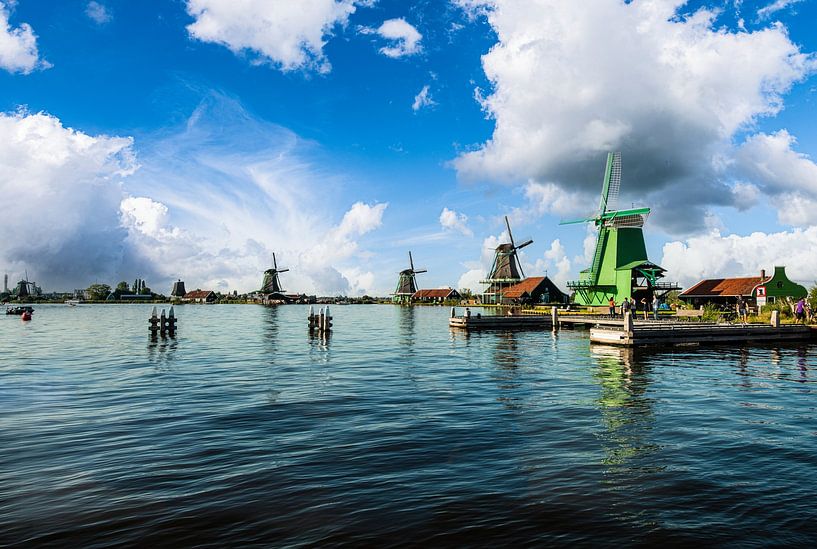 Zaanse Schans view across the water with windmills. by Brian Morgan