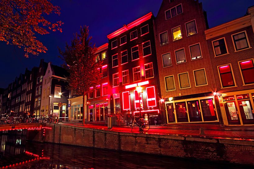 Red Light District in Amsterdam Netherlands at night by Eye on You