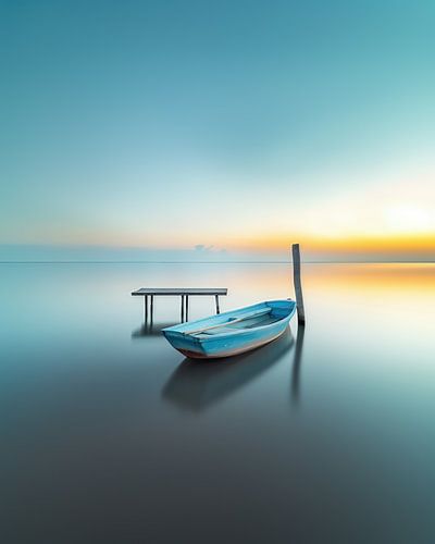Calm sea, boat drifting