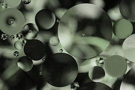 Abstract: Cirkels in groen tinten van Marjolijn van den Berg