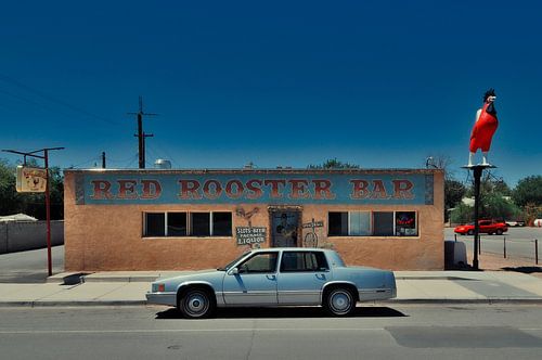 Vintage car at Red Rooster Bar along route 66 United States.