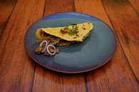 Taco met gehakt-avocado-ui vulling op een bord. van Babetts Bildergalerie thumbnail