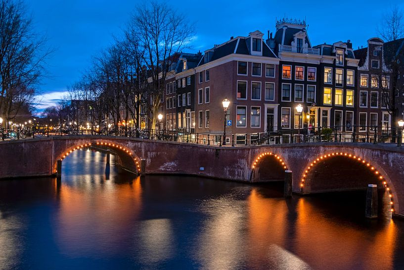 Amsterdam canals by night in the Netherlands by Eye on You