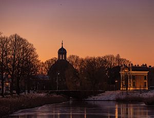 Lever de soleil entre l'Église orientale et le Koepoort