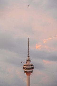 KL Tower in Kuala Lumpur with sunset by Stijn van Straalen