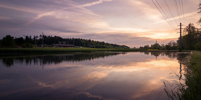 Zonsondergang met reflectie van Severin Pomsel