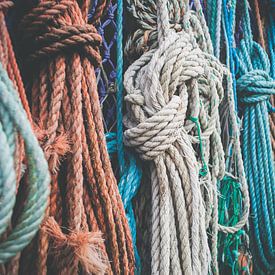 Nautical background. Closeup of old colorful mooring ropes by Fotografiecor .nl