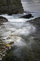 High tide on the rocky coast near Gijon