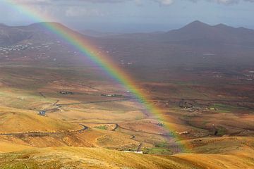 Panoramic view from the viewpoint Mirador Morro Velosa on Fuerteventura with rainbow by Reiner Conrad