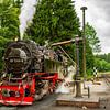 Steam train water refueling in the Harz in Germany by Jan van Broekhoven