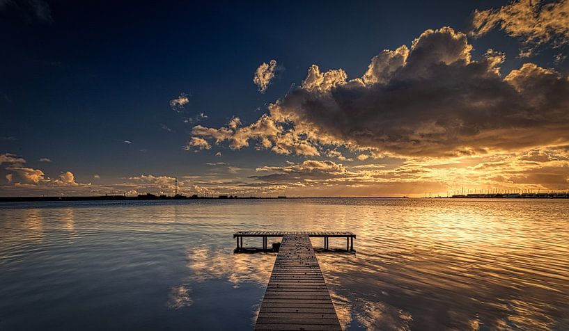 Jetty at south harbour with clouds by peterheinspictures