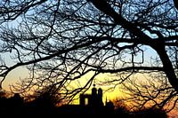 Sonnenuntergang zur Mittagszeit im Greenwich Park