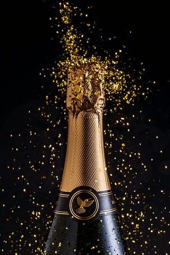 Champagne fles met gouden glitters