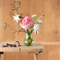 Still life of bouquet of flowers with old steel nails