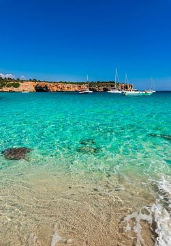 Idyllic bay with luxury sailing yachts at Cala Varques by Alex Winter
