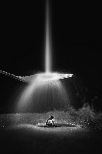 miniature people reads a book while it rains by Jolanda Aalbers