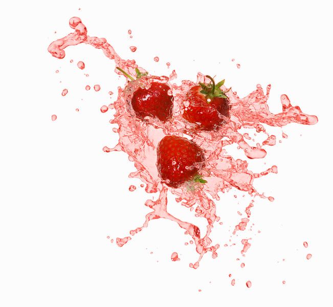 12599768 Strawberries in a splash of fruit juice by BeeldigBeeld Food & Lifestyle