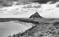 The Mont Saint-Michel seen from along the side of the river Couesnon