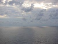 Zon door de wolken