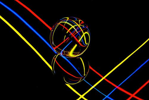 Glass sphere with coloured stripes