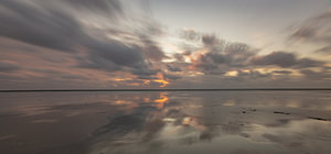 Zonsondergang aan het strand