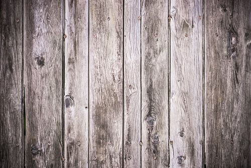 Old gray wooden planks with vignette frame