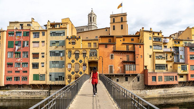 Girl on bridge in Girona, Spain by Jessica Lokker