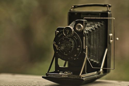 Antieke camera gefotografeerd met een nieuwe camera en oude USSR Jupiter 9lens