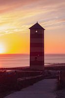 de Vuurtoren dishoek voor zonsondergang