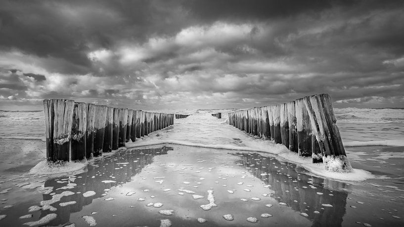 Wavebreakers at stormy Dutch coast by Michel Seelen