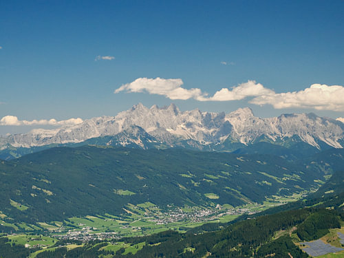 A panoramic view of the Alps above the valley