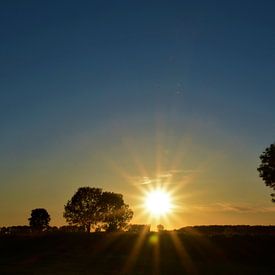 coucher de soleil sur le polder sur A'da de Bruin