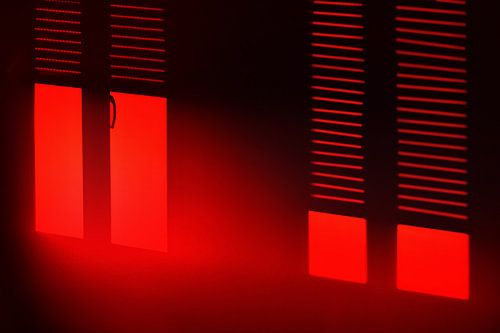 Mysterious window illuminated with red light
