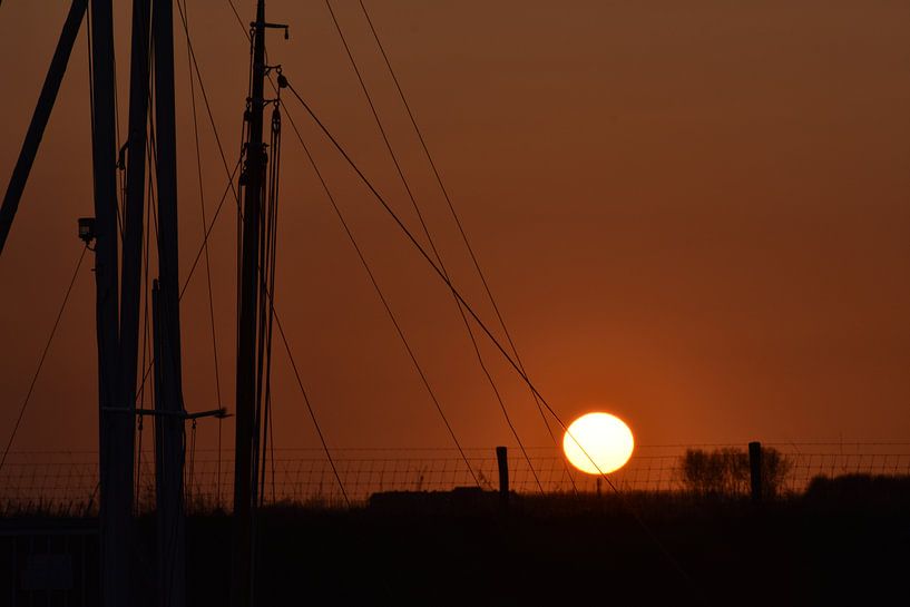 Zonsondergang bij de haven van Henk-Jan Lubbers