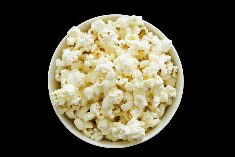 Bowl filled with popcorn on a black background by Nicole