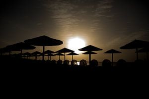 Eindeloze zonsondergangen aan zee van Laura V