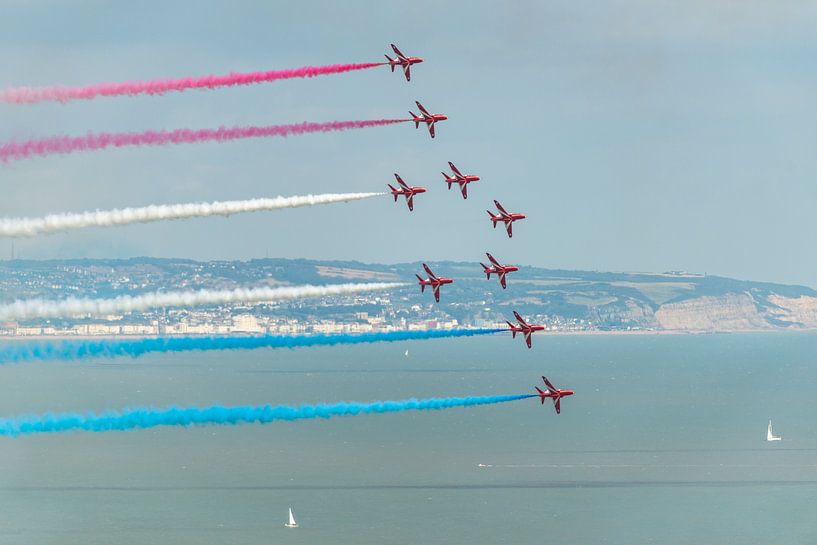 The Royal Air Force's Red Arrows in action during the 2014 Eastbourne International Airshow. by Jaap van den Berg