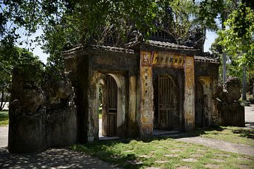 Ancient carved portal of a Vietnamese pagoda by Frank Photos