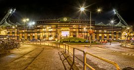 Evening photo of the Parkstad Limburg Stadium by John Kreukniet