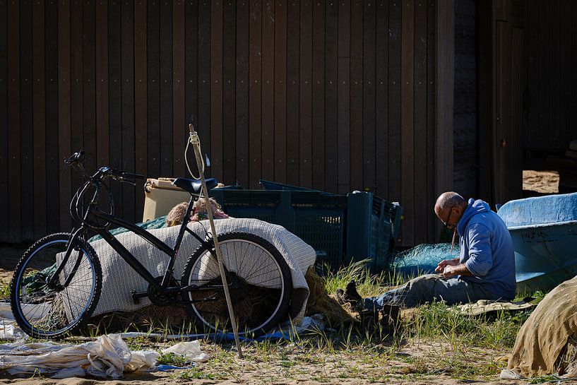 Repairing fishing nets by Eddy Westdijk