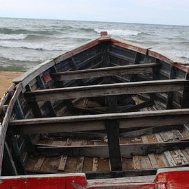 Boat for repair on the beach by Jennifer van Wijk