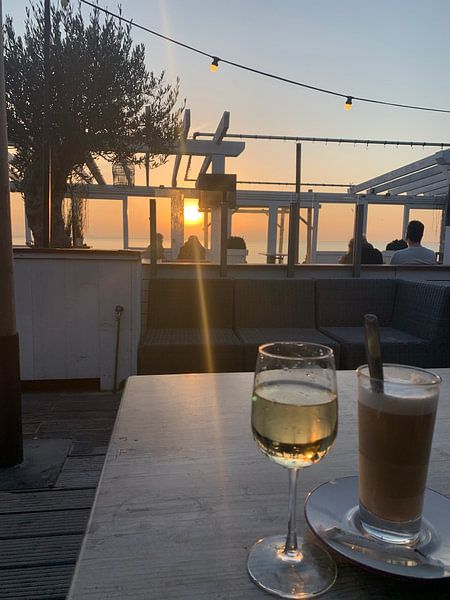 Sunset from terrace on the beach. by Eric Reijbroek