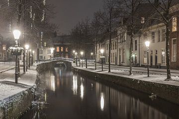 Snowy Amersfoort in the evening by Karin Riethoven