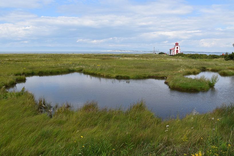A small lighthouse on the riverbank by Claude Laprise