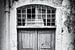 Photographie en noir et blanc d'une vieille porte en bois à Rethymnon, Crète | Photographie de voyag sur Diana van Neck Photography