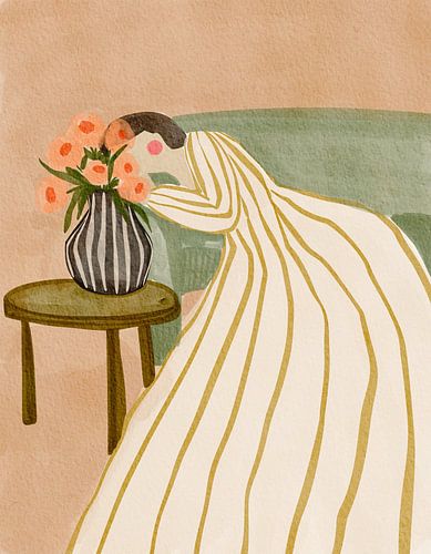Une femme admirant des fleurs