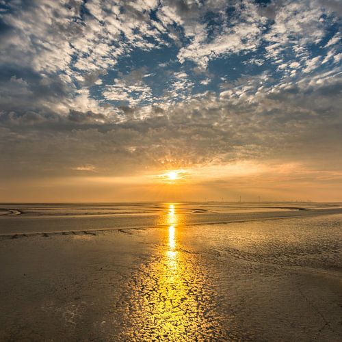 Zonsopkomst boven de monding van de Eems