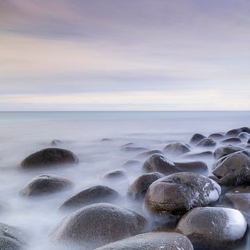 Round stones in a coastal landscape by Charlotte Jalvingh